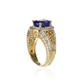 KatNr 891 Opulenter Gelbgold-Ring mit Tansanit im Ovalschliff.