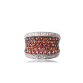 KatNr 905 Pavé-Ring mit orangen Topasen und Brillanten. Wohl John C. Rinkler, USA. 21. Jh.