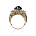 KatNr 910 Gelbgold-Ring mit großem Stern-Saphir.