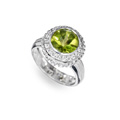KatNr 887   Weißgold-Ring mit Turmalin und Brillant-Entourage.