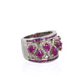 KatNr 610 Extravaganter Weißgold-Ring mit Diamant-Mäander und Rubinen. John C. Rinker, USA.
