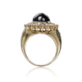 KatNr 604 Gelbgold-Ring mit großem Stern-Saphir.