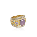 Band ring with floral motif and central chalcedony (approx. 1.8 ct).