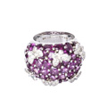 KatNr 807 Auffälliger Weißgold-Ring mit breitem violettem Turmalinpavé und applizierten Diamantschmetterlingen.