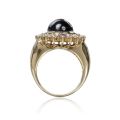 KatNr 1070 Gelbgold-Ring mit großem Stern-Saphir. Late 20th / 21st century.