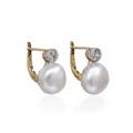 KatNr 640 A pair of natural pearl and diamond earrings. Probably jeweller H. V. Voges, Dresden. Around 1920.