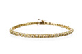 KatNr 581&nbsp;&nbsp; Filigranes Gelbgold-Brillant-Rivièrearmband "Champagner" (sog. Tennisarmband).