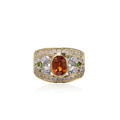 KatNr 817 Bandring mit Schleifen aus Diamant und ein zentralen orangem Saphir.